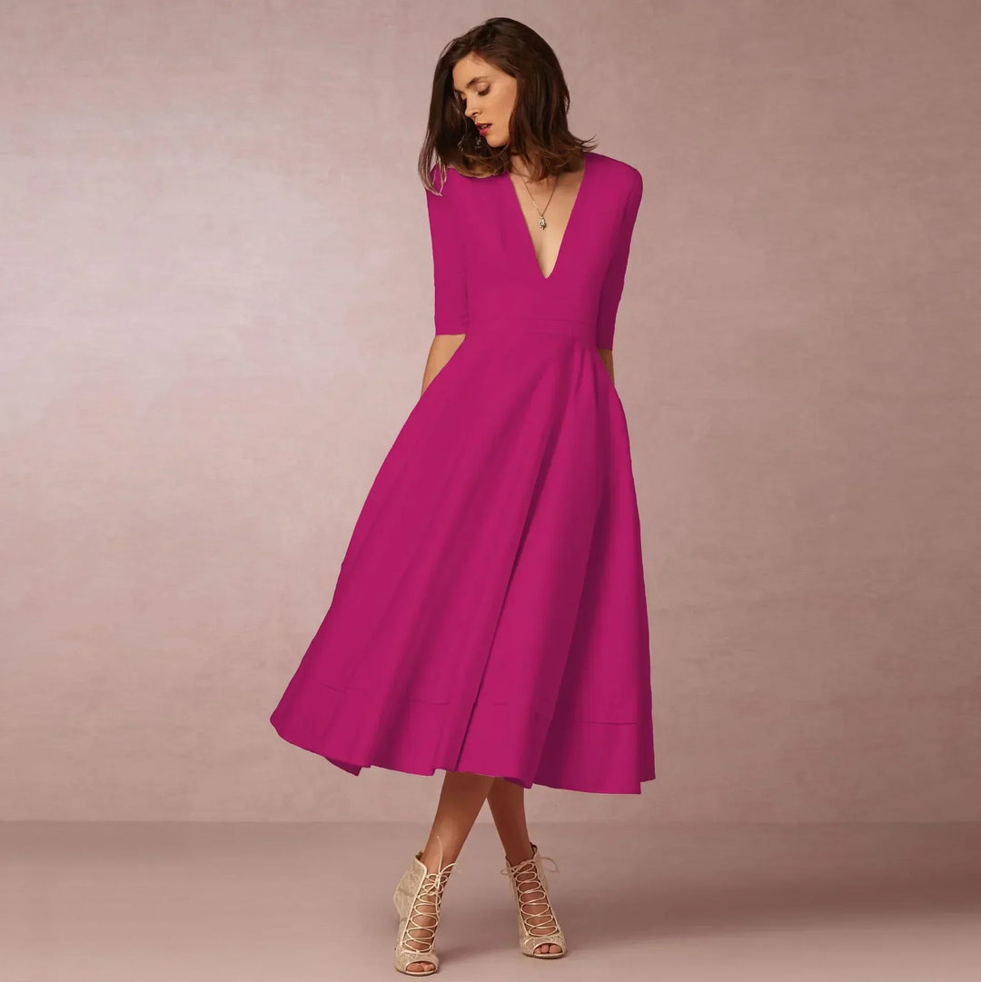 Close-up of the elegant neckline on a fitted midi dress for women, ideal for summer & cocktail events.