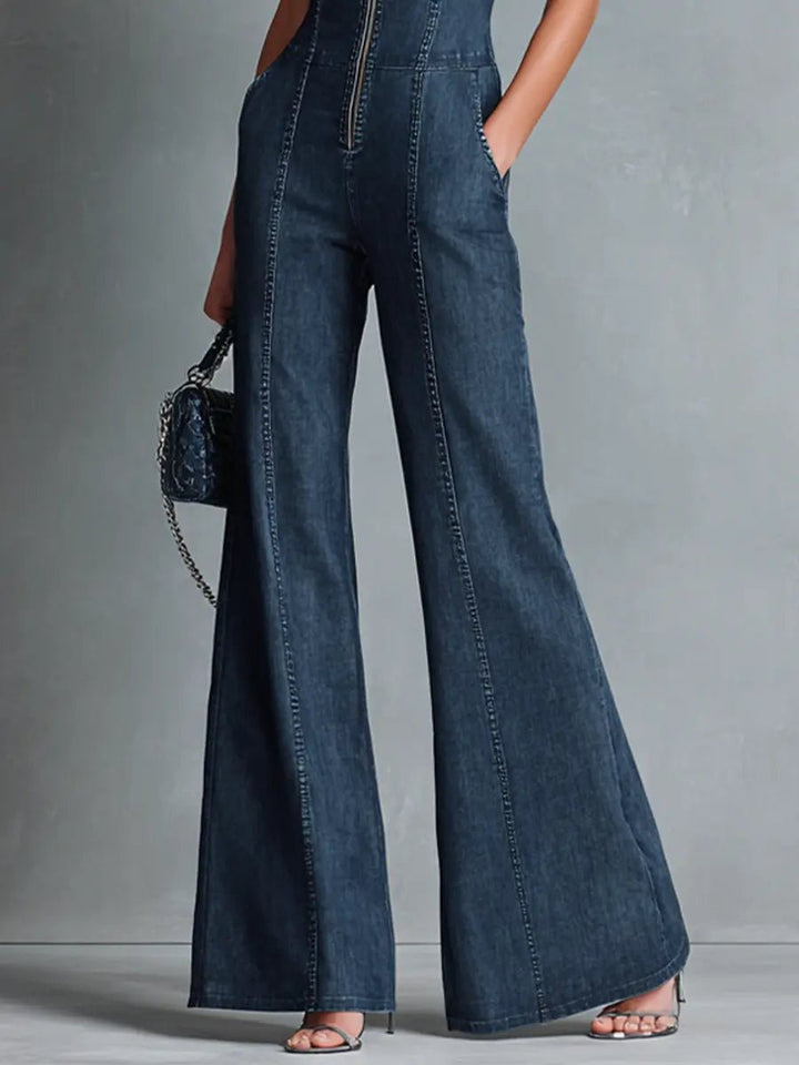 Sophisticated women's flared jumpsuit with a high neckline and zip closure, offering an elegant retro look.
