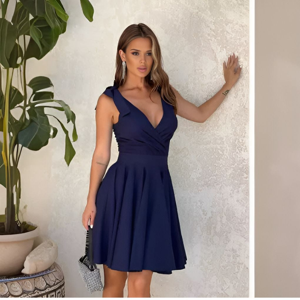 Stylish women's summer dress with a comfortable adjustable waist and a beautiful flared hem.