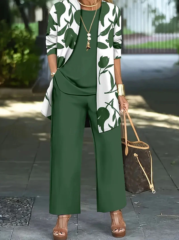 Sophisticated women's floral 3-piece outfit set. Features elegant pattern top, pants & jacket for a comfortable, chic look.