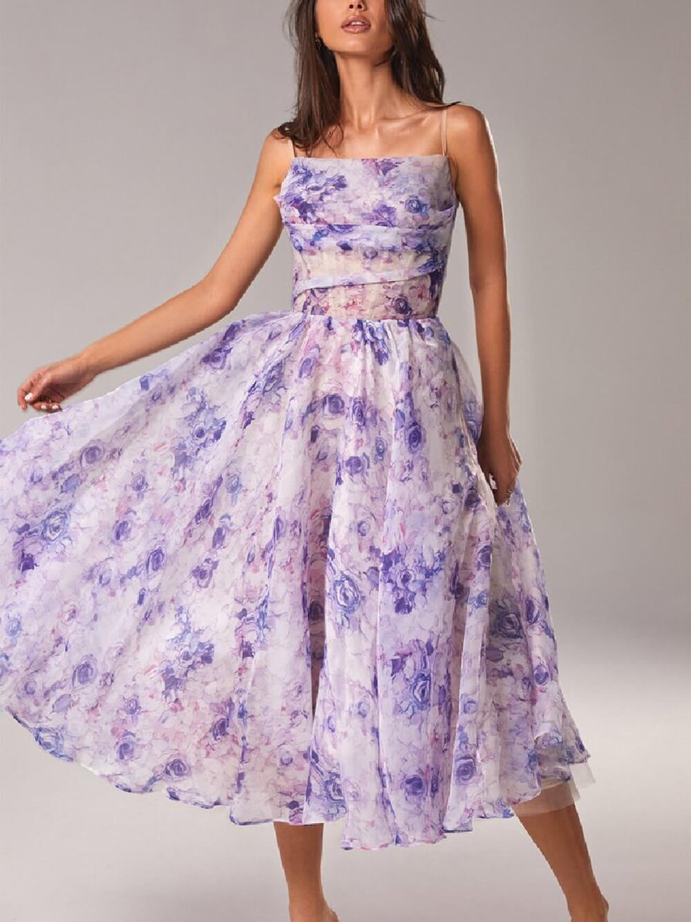 Chic women's floral spaghetti strap A-line midi dress, a fashionable and elegant choice for summer and special occasions.