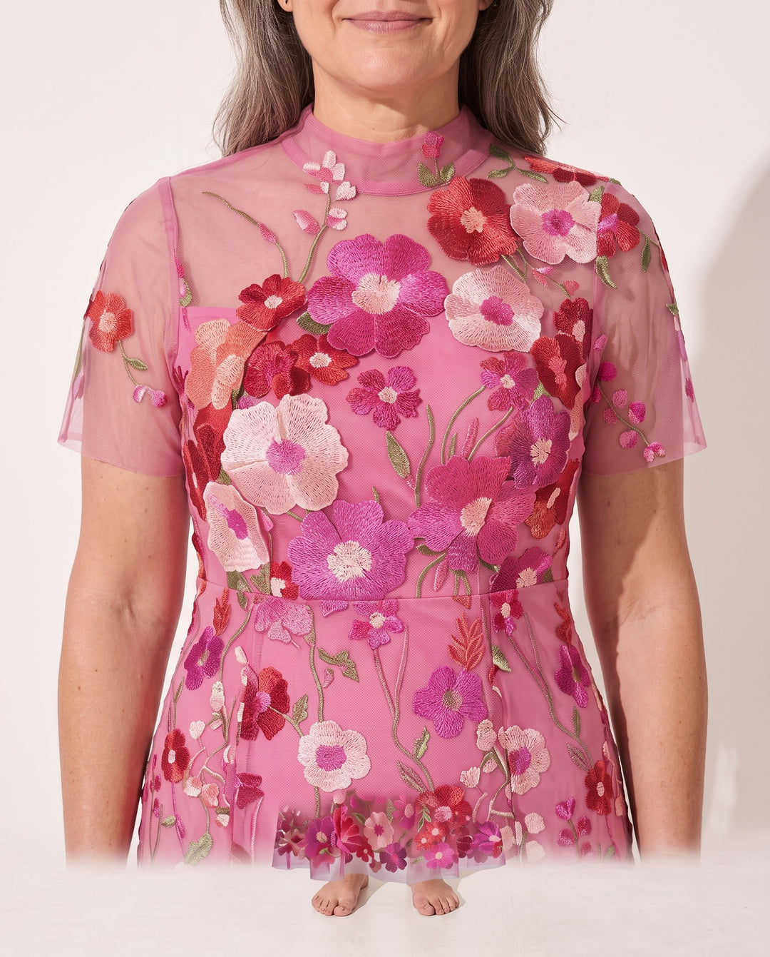 Chic autumn wedding guest dress: women's midi with intricate floral appliqué and sheer sleeves for elegant occasions.