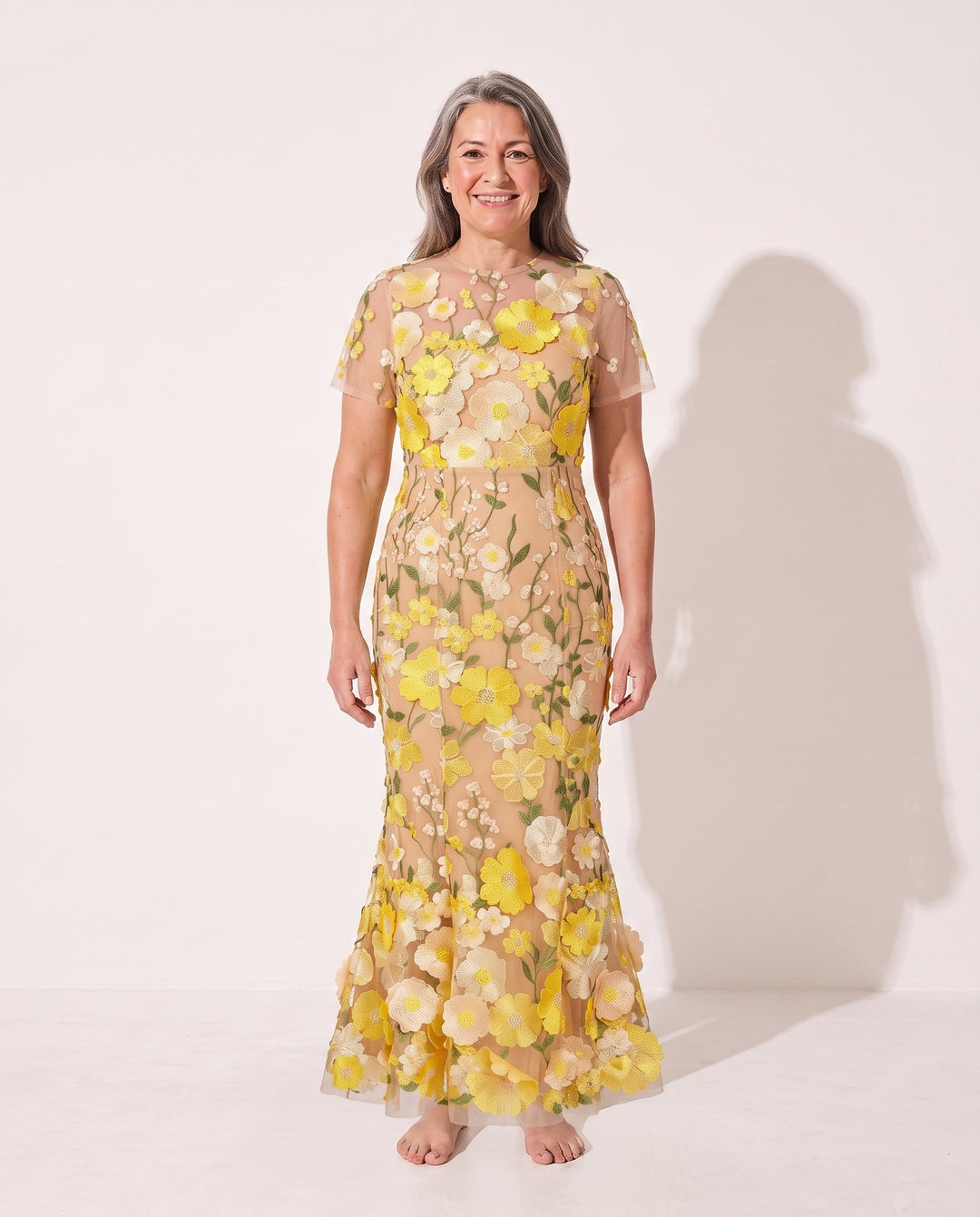 Beautiful women's floral appliqué midi dress, a stylish and elegant fashion choice for any special occasion.