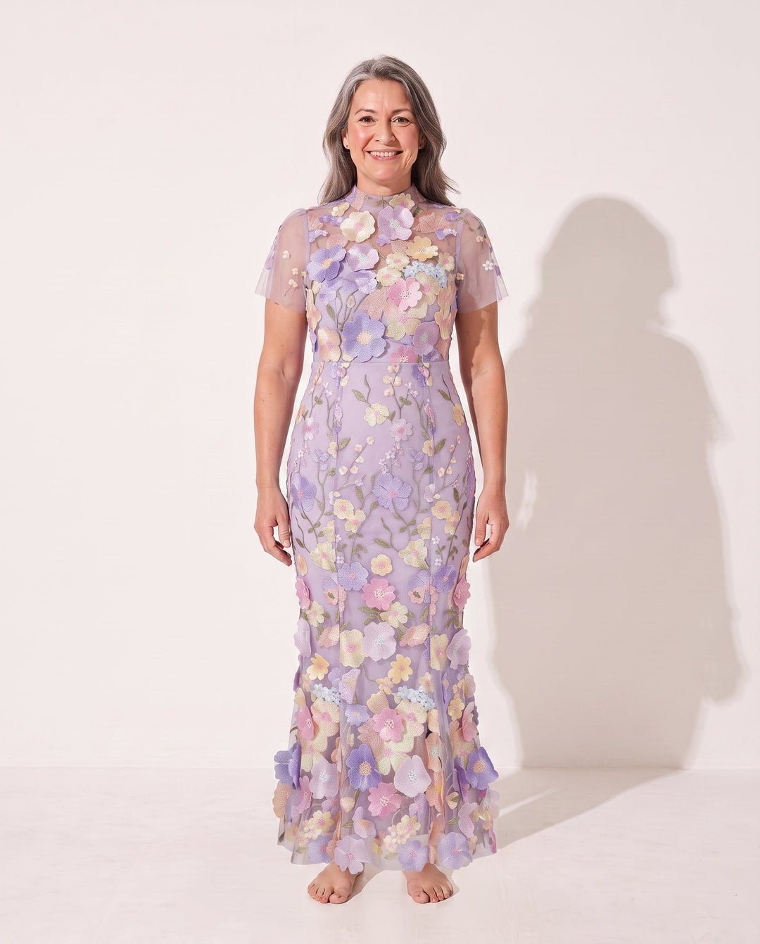 Women's elegant floral appliqué midi dress with sheer sleeves, ideal for wedding guests & formal occasions.