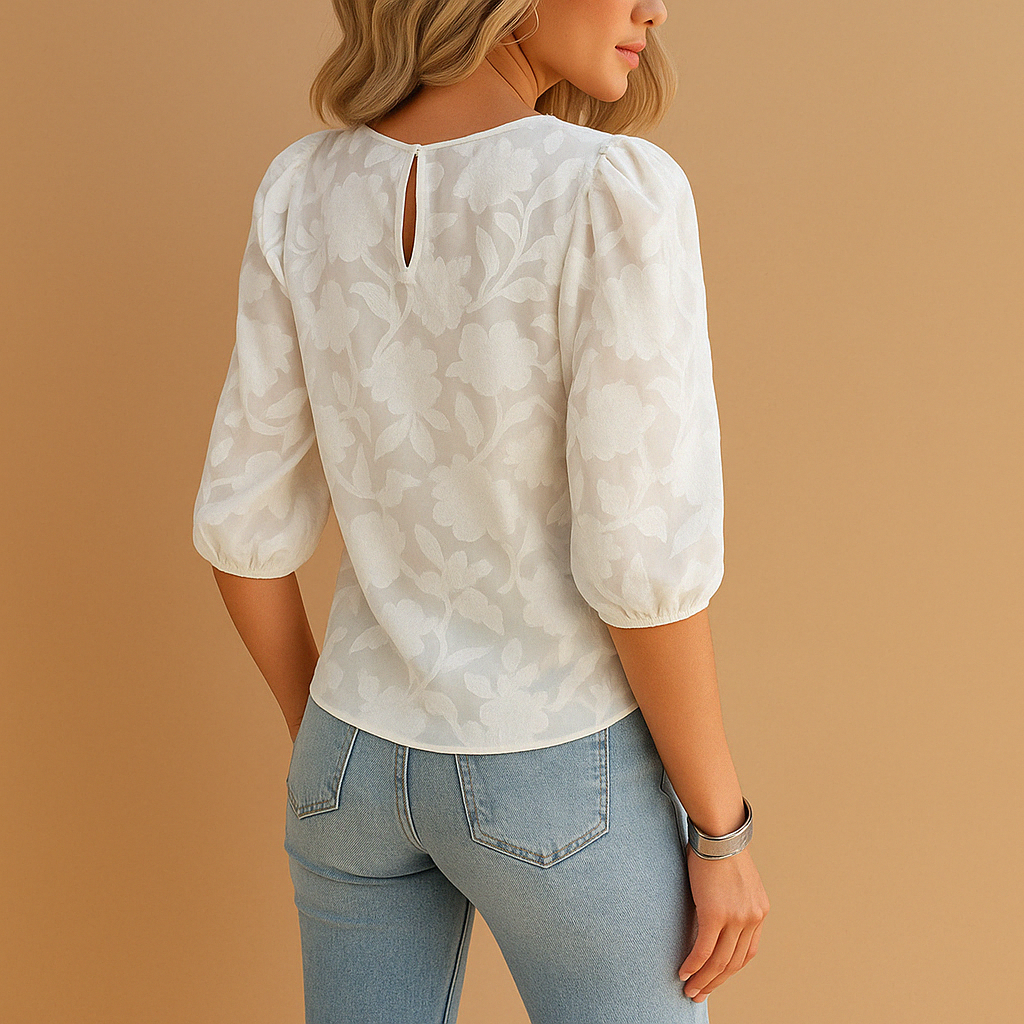 Feminine floral print women's blouse, a lightweight and versatile top perfect for elegant spring/summer fashion.