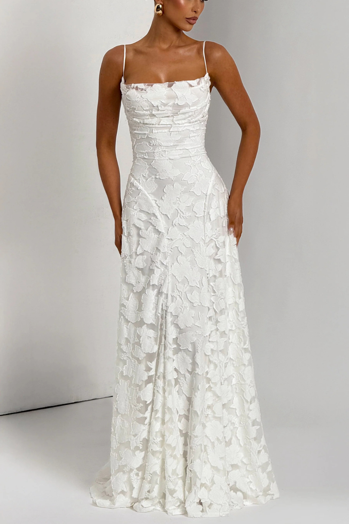 Elegant women's brocade maxi dress with stunning floral design for parties.
