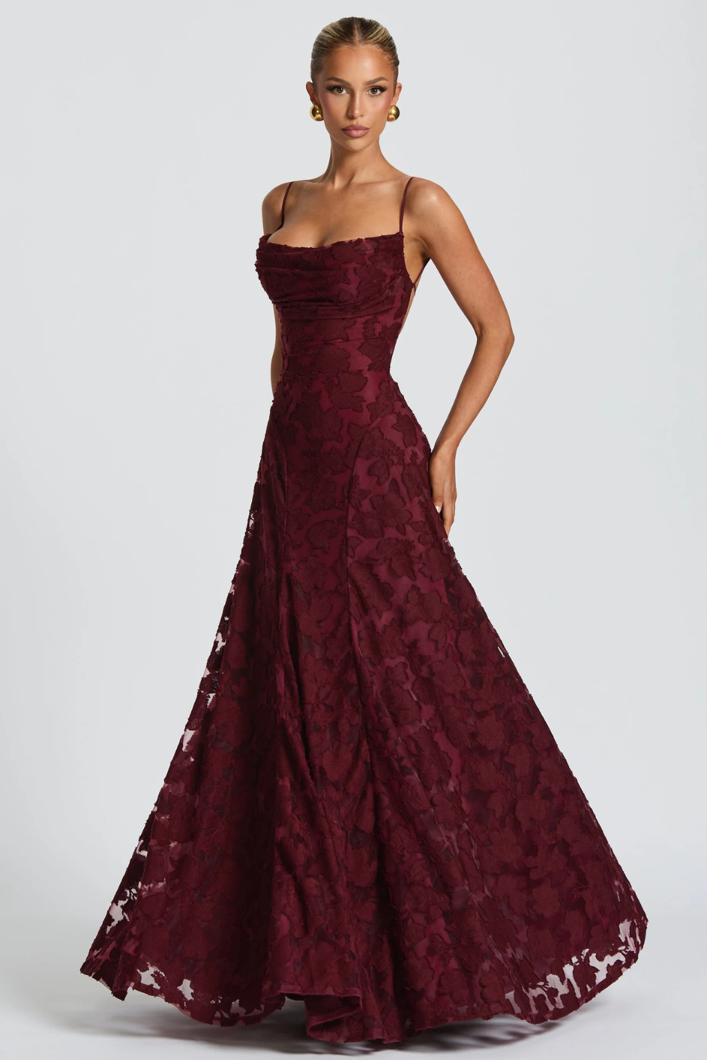 Chic cami strap brocade maxi dress with floral pattern, a formal evening gown.