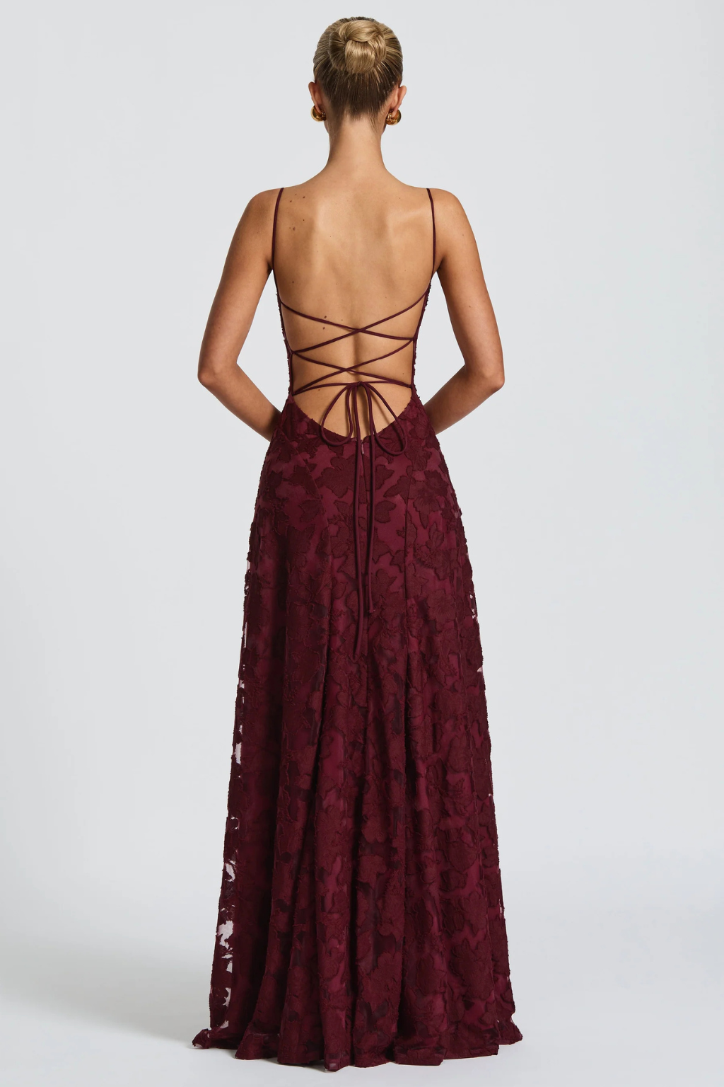 Elegant floral maxi dress in brocade, suitable for evening & special occasions.