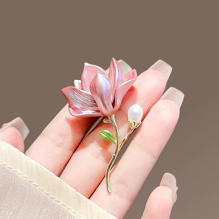 Stylish pink and purple flower brooch for women, a beautiful enamel pin accessory for jackets & scarves.
