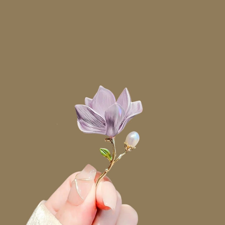 Stunning floral brooch for women, featuring vibrant pink and purple tones, a chic fashion jewelry gift.