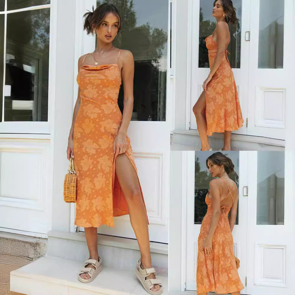 Women's floral print cowl neck midi slip dress with a sophisticated high slit, ideal for evening events.