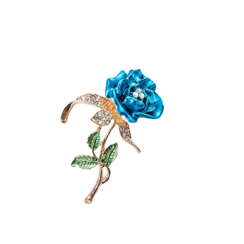 Chic women's crystal flower brooch with delicate enamel petals, a stunning statement jewelry piece.