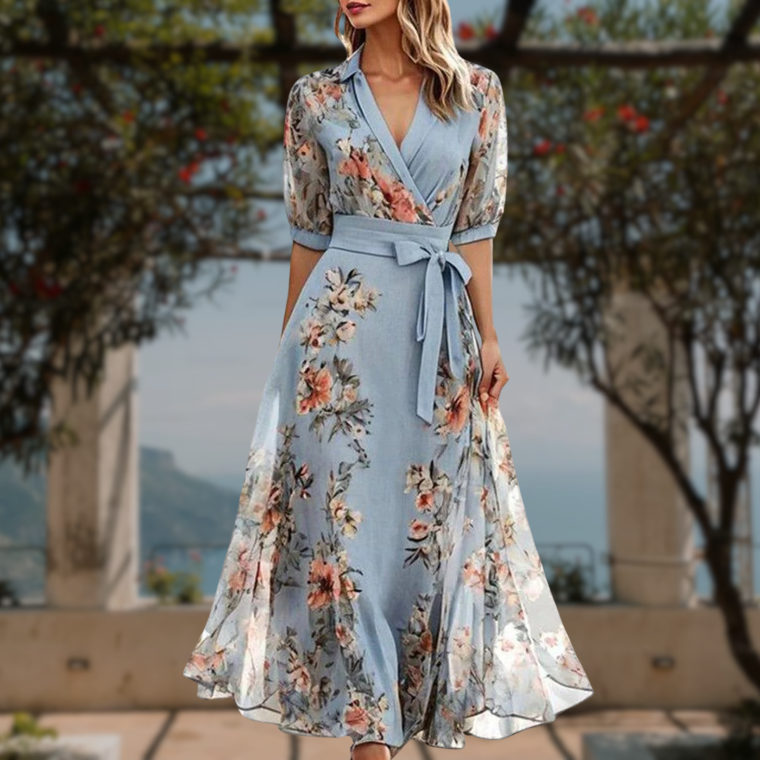 Elegant women's floral flowing maxi dress, perfect as a wedding guest or special occasion attire.