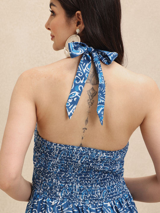 Breezy floral halterneck maxi dress for women, an effortless and elegant summer style. Perfect for beach or party.