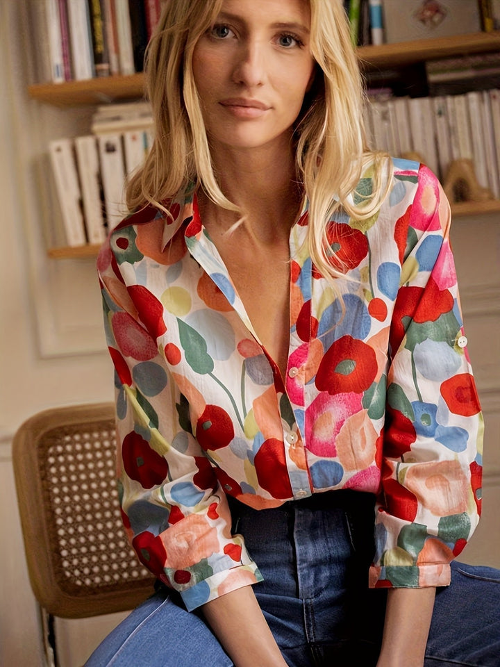 Comfortable women's relaxed fit floral long sleeve button-down top. Elegant print blouse, ideal for versatile spring fashion.