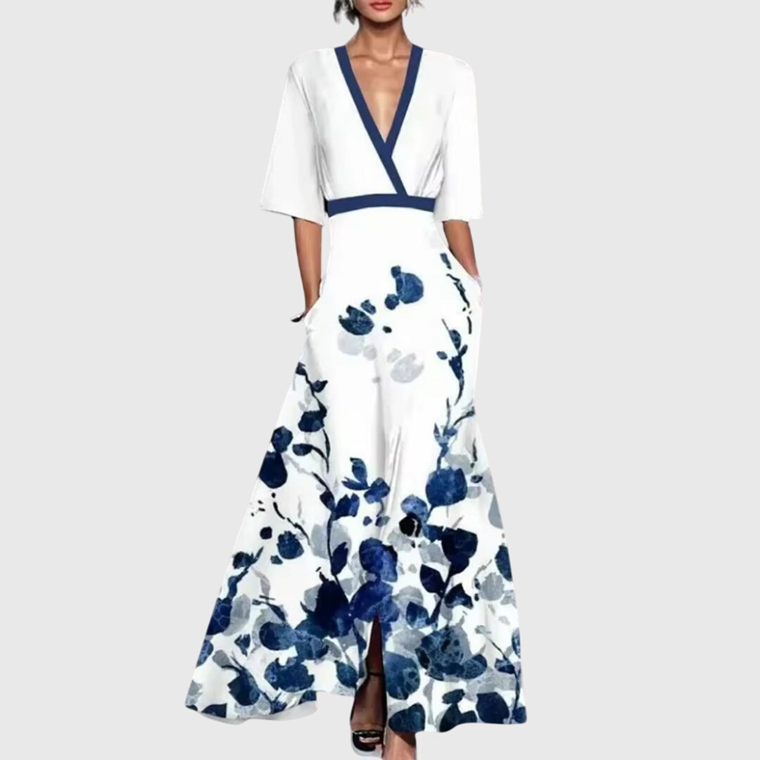 Elegant women's floral maxi dress in vibrant red, white, & green print, perfect for spring & summer parties.