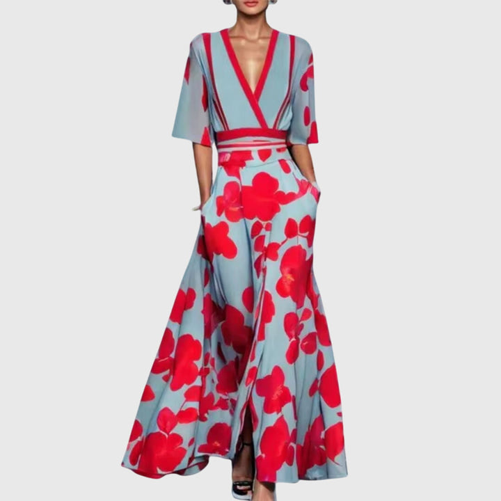 Beautiful women's elegant floral print maxi dress featuring red, white, green blooms for spring/summer fashion.