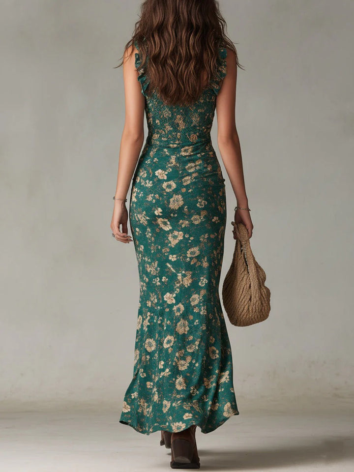 Sleeveless elegant floral maxi dress for women, featuring a chic ruched bodice, suitable for evening wear.