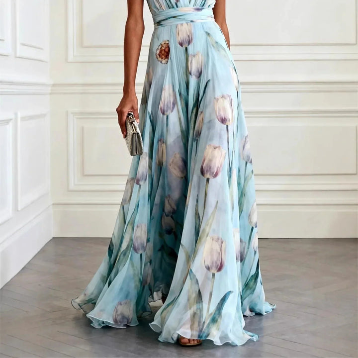 Chic floral long maxi dress for women, ideal as a wedding guest or elegant party dress. Features a V-neck.