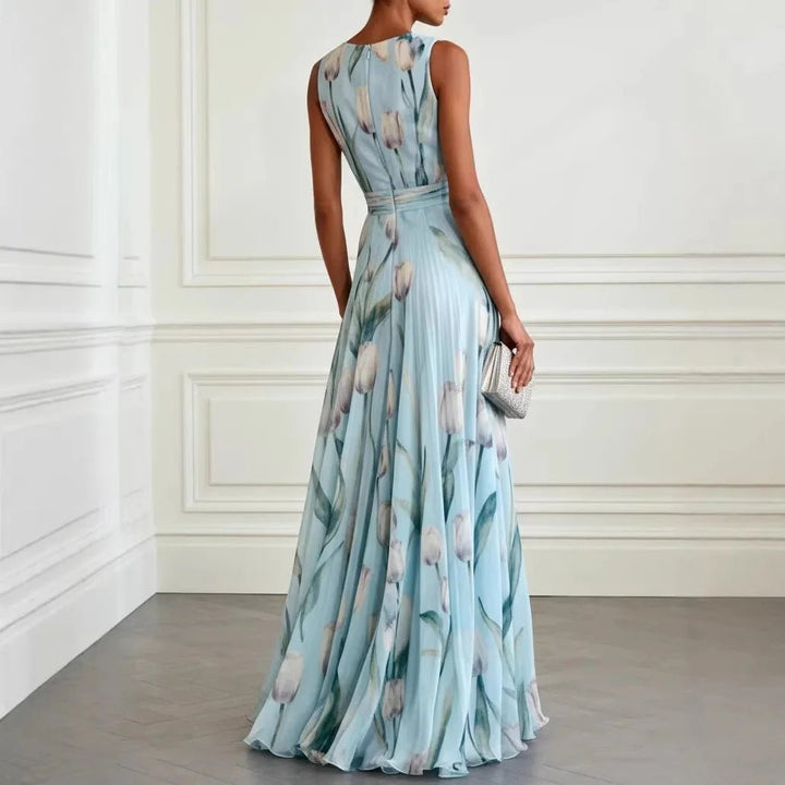 Beautiful women's floral print maxi dress featuring a deep V-neckline & flowing silhouette for elegant occasions.