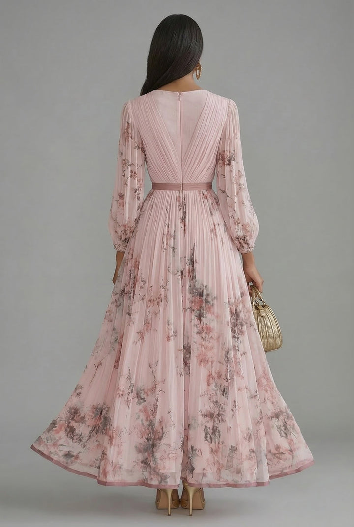 Fashionable women's floral maxi dress, pleated skirt design, deep V-neck & long sleeves. Evening wear.