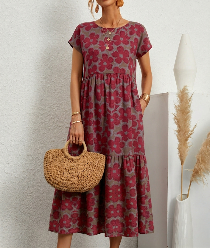 Elegant women's floral midi dress, perfect for occasions. Features a vibrant spring pattern and flowy design.