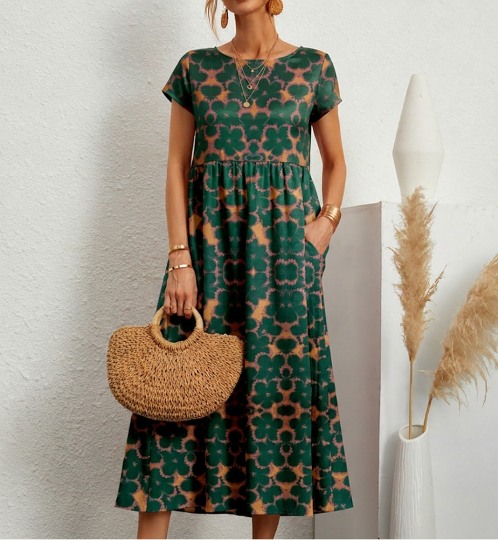 Chic women's floral midi dress, suitable for any occasion. Elegant, comfortable, and stylish for parties or casual wear.