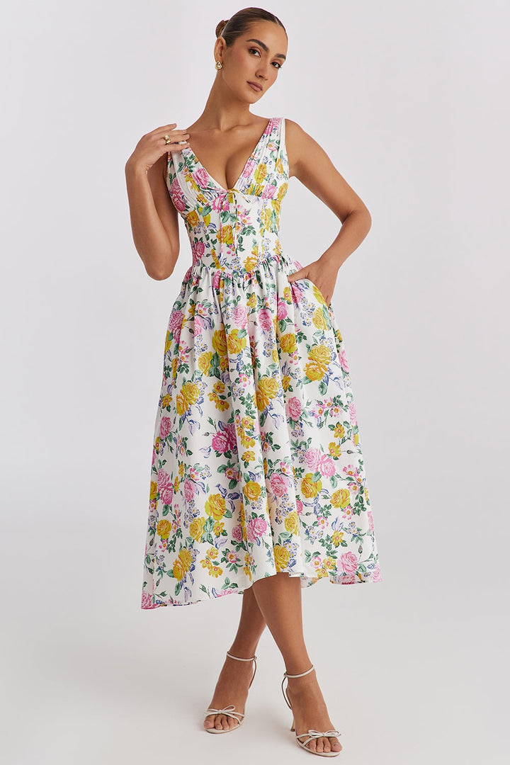 Elegant women's floral midi dress, perfect for summer parties. Short sleeve, flowy fabric.