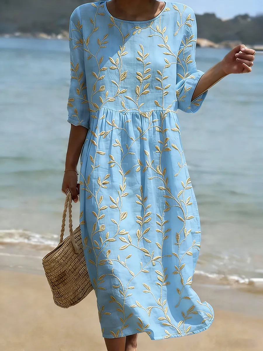 Elegant women's floral midi dress, perfect for summer & spring. Comfortable, versatile day or evening wear with a feminine print.