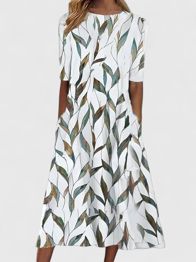 Sophisticated women's floral midi dress with round neckline & easy care fabric. Ideal for day wear, vacation or elegant summer.