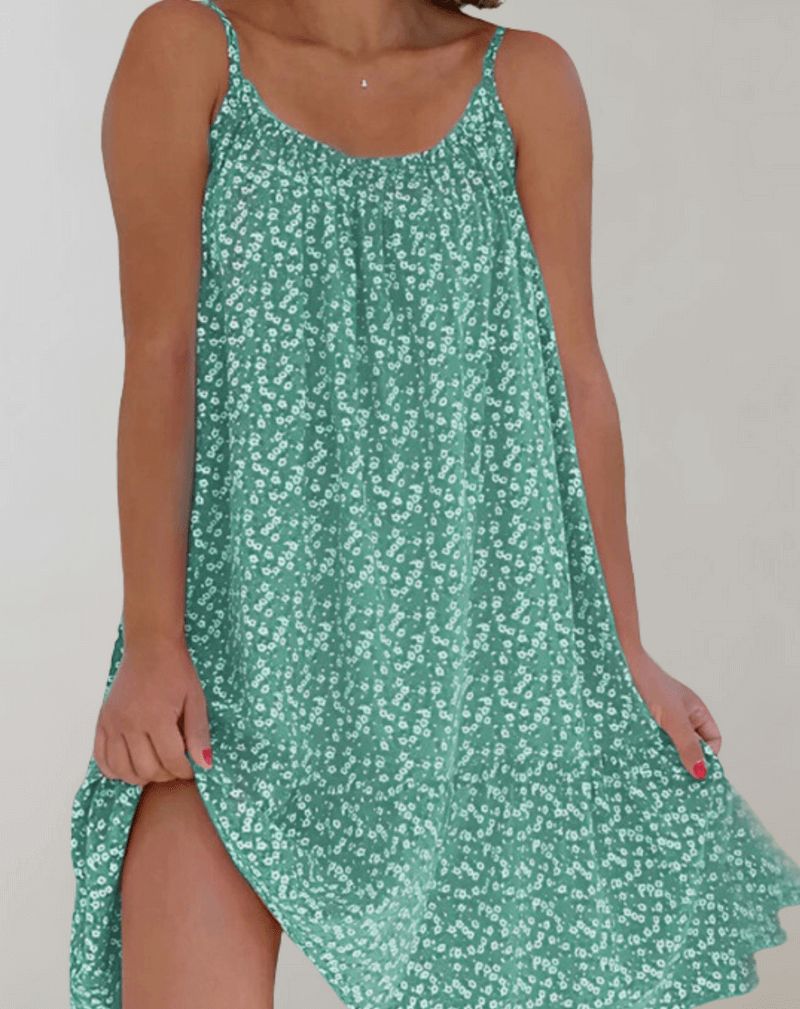 Effortless floral midi dress for women, ideal for casual summer wear or elegant parties. Comfortable fit.