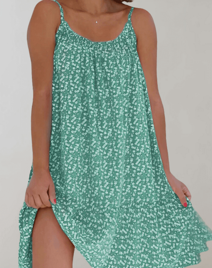 Effortless floral midi dress for women, ideal for casual summer wear or elegant parties. Comfortable fit.
