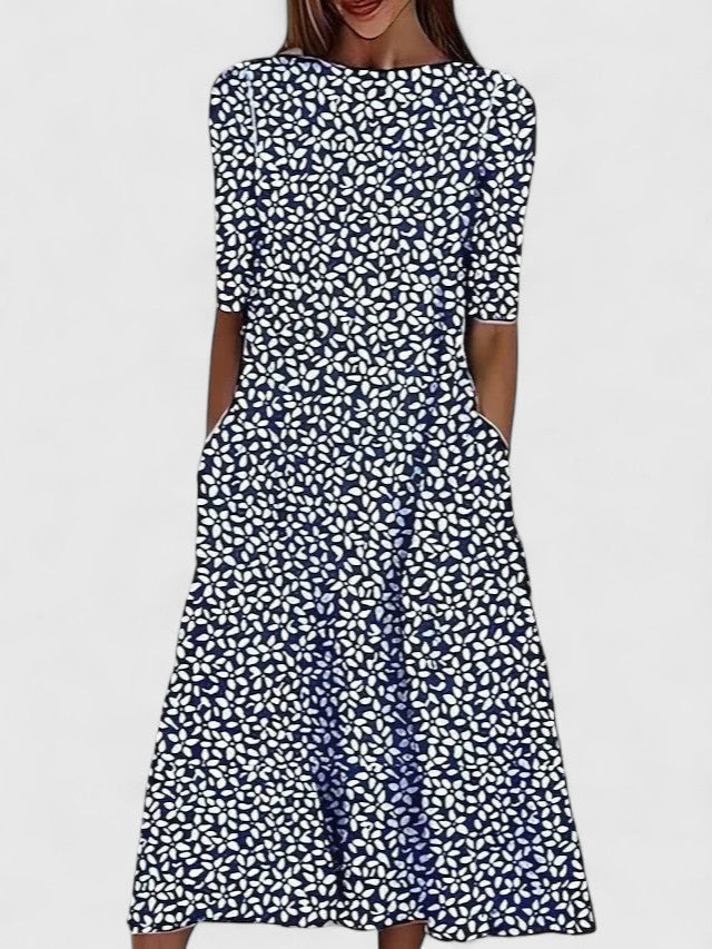 Comfortable women's floral midi dress, a chic day dress for summer fashion. Elegant, stretch fit design for versatile wear.
