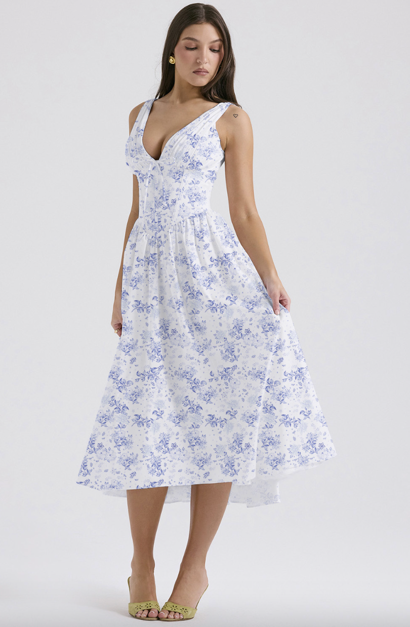 Chic women's floral midi dress for summer fashion. Elegant, flowy, and versatile for any occasion.