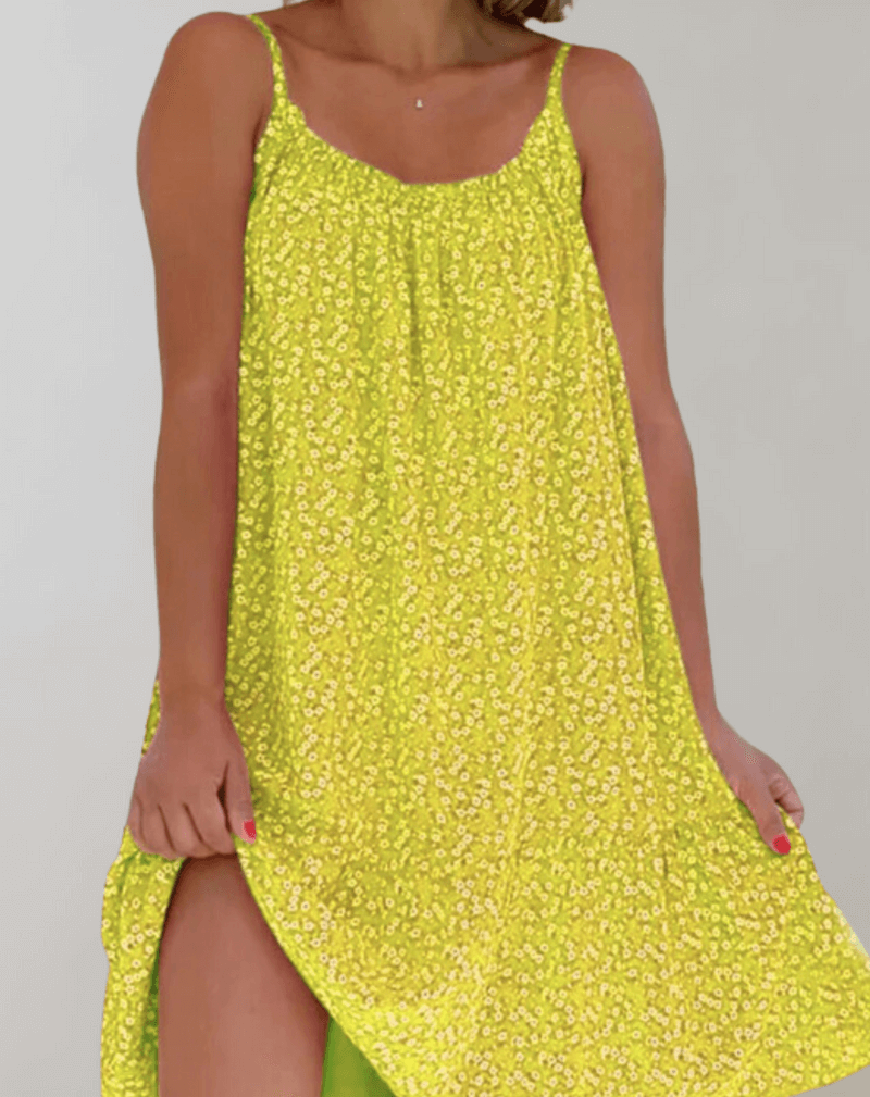 Chic women's floral midi dress, a stunning sleeveless A-line piece for elegant summer fashion and parties.