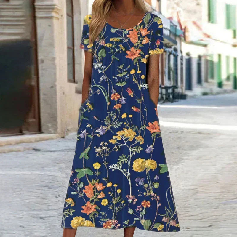 Elegant women's floral midi dress with a comfortable V-neck, perfect for summer parties or casual wear.