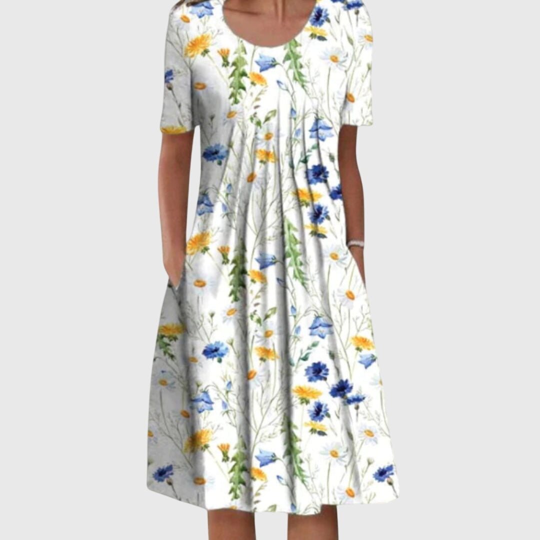 Comfortable & versatile women's round neck dress featuring a vibrant floral print, ideal for any occasion.