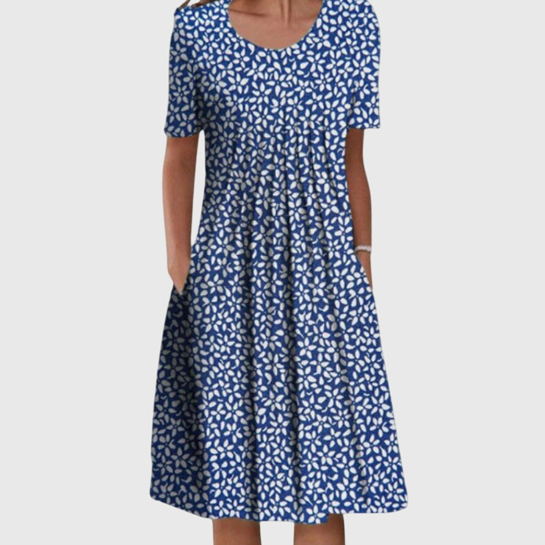 Chic women's elegant round neck dress with a beautiful floral print, a stylish choice for summer fashion.