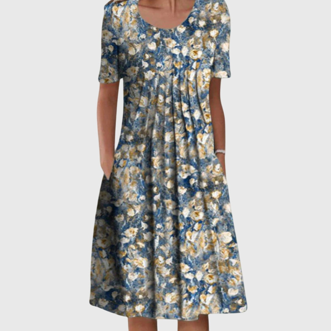 Stylish women's floral midi dress, a comfortable round neck design with an elegant print for versatile wear.