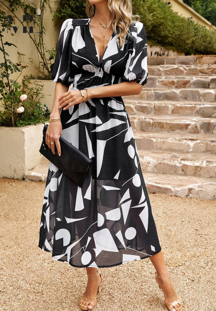 Beautiful floral pattern on a women's midi dress with trendy puff sleeves and a classic V-neck style.