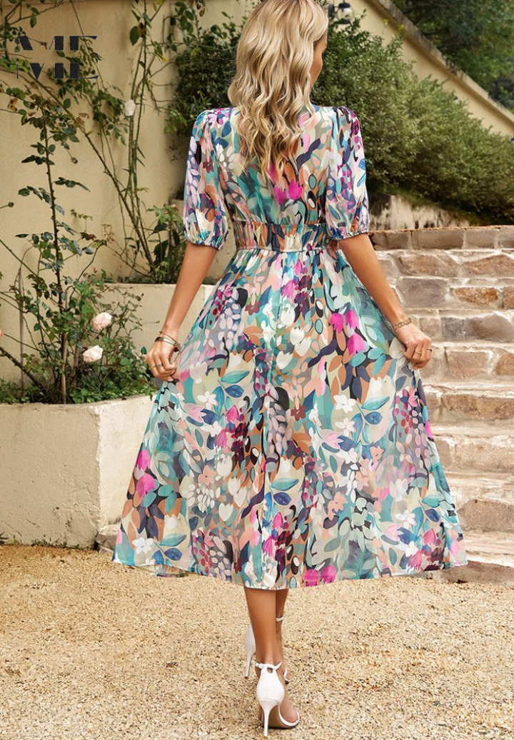 A-line floral midi dress for women, featuring stylish puff sleeves and a beautiful V-neck, ideal for summer.