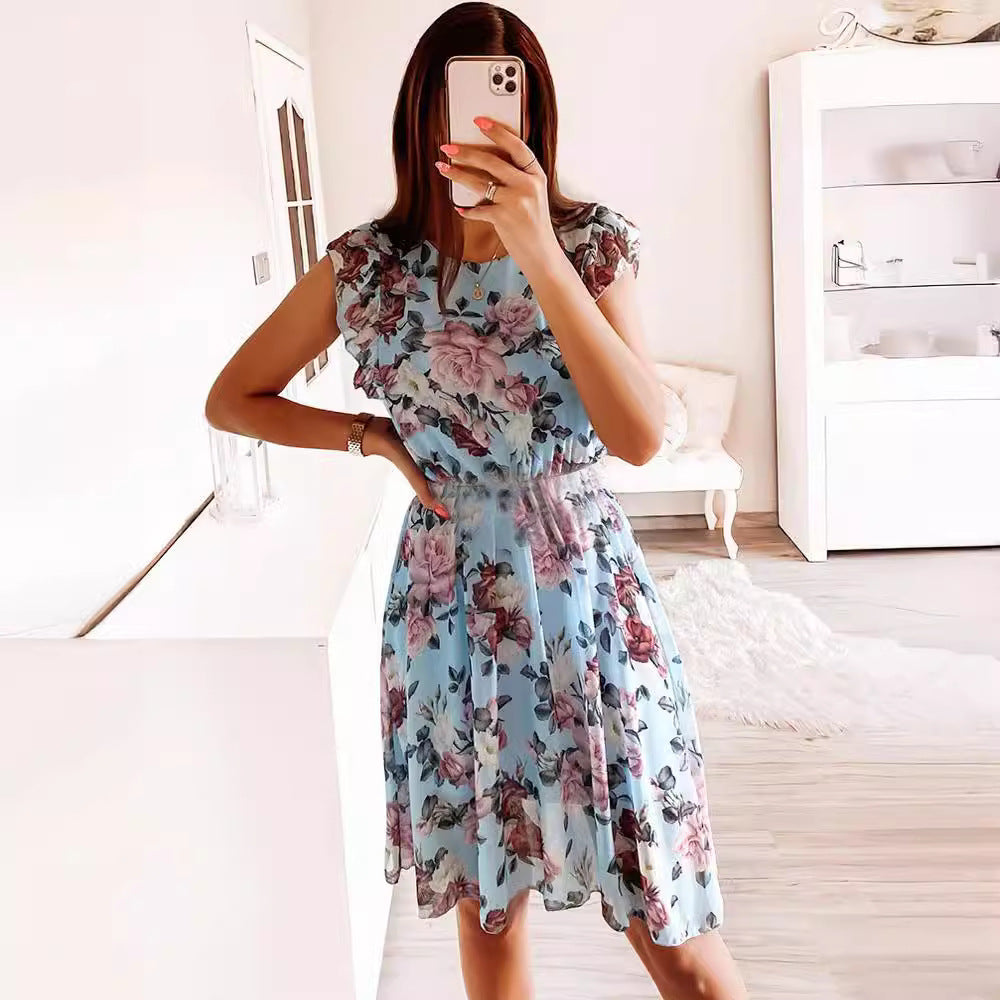 Flowing women's floral midi dress with charming ruffle sleeves, soft fabric, ideal for spring and summer fashion.