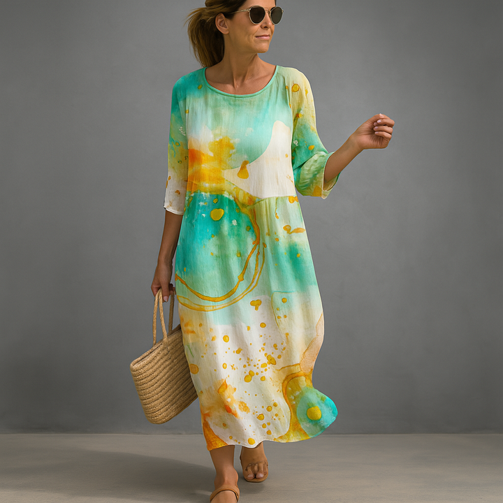 Stylish women's summer midi dress featuring a vibrant floral pattern and comfortable fit for casual or party wear.