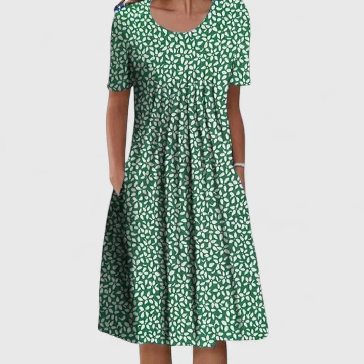 Versatile women's midi dress, merging a timeless polka dot base with a fresh floral overlay.