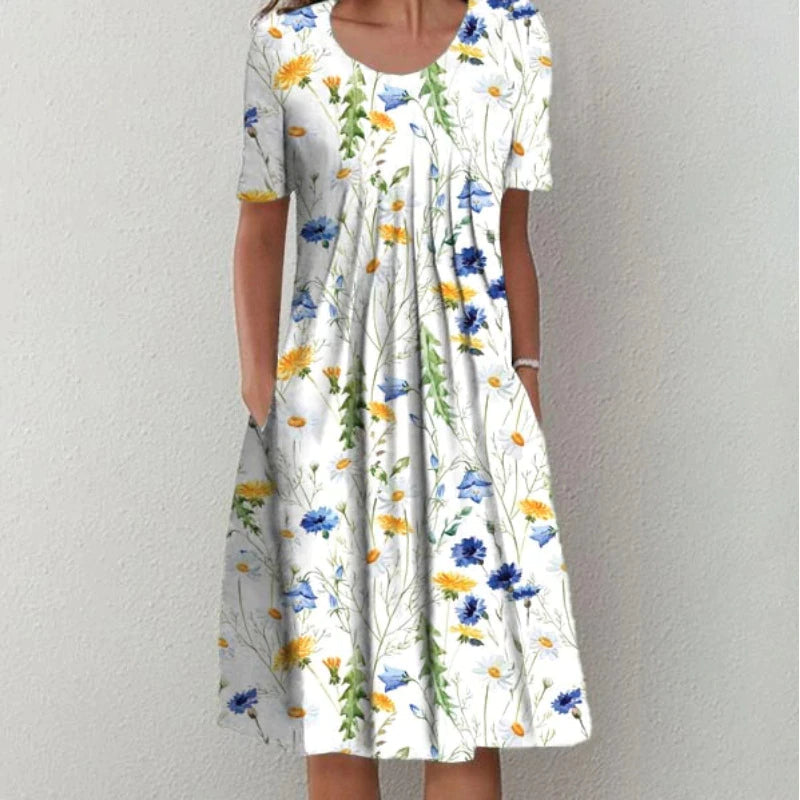 Sophisticated women's midi dress featuring a vibrant floral pattern and subtle polka dots for versatility.