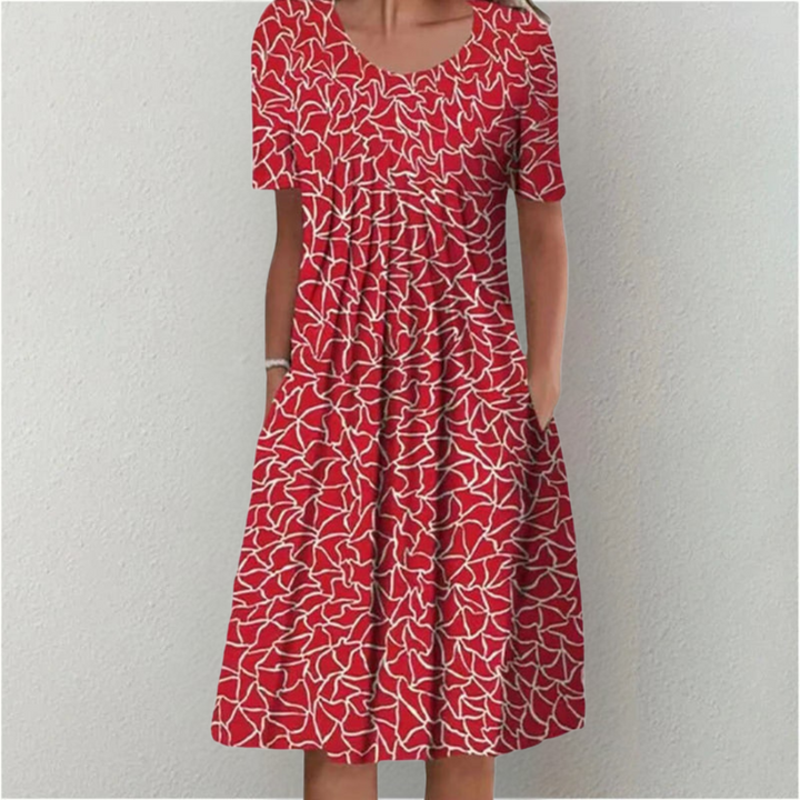 Stylish women's spring midi dress with an eye-catching floral print & delicate polka dots.