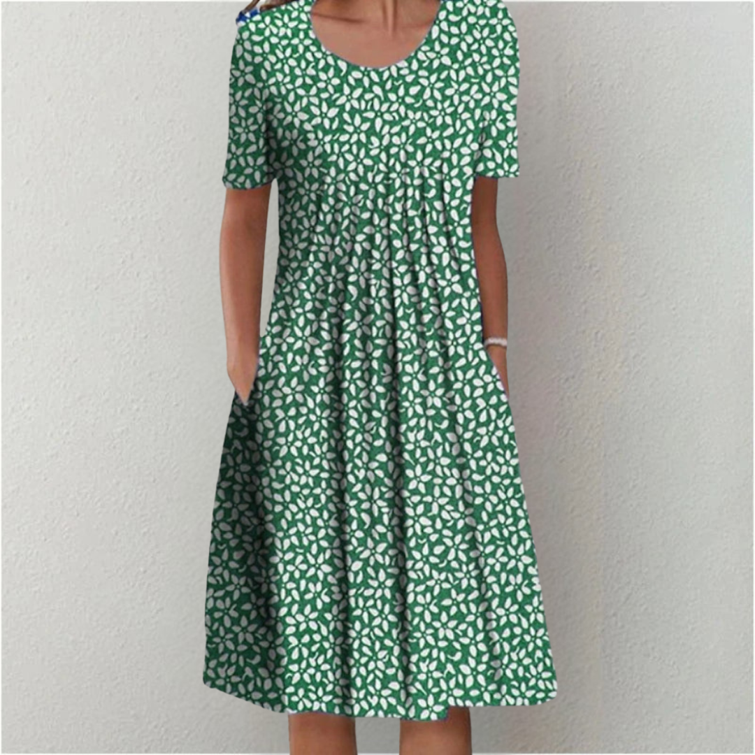 Elegant women's floral midi dress, a stunning piece with subtle polka dot details for sophisticated flair.
