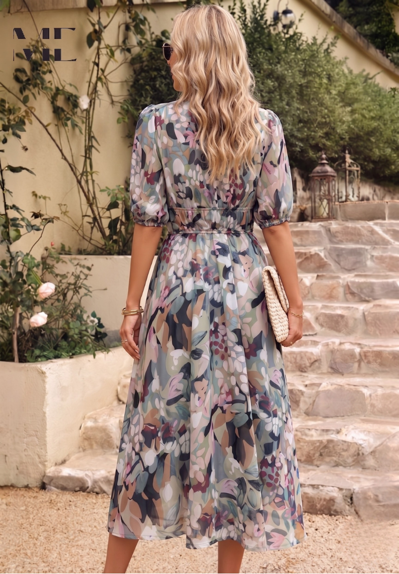 Vibrant floral print midi dress for women, featuring elegant puff sleeves. Comfortable and versatile summer fashion.