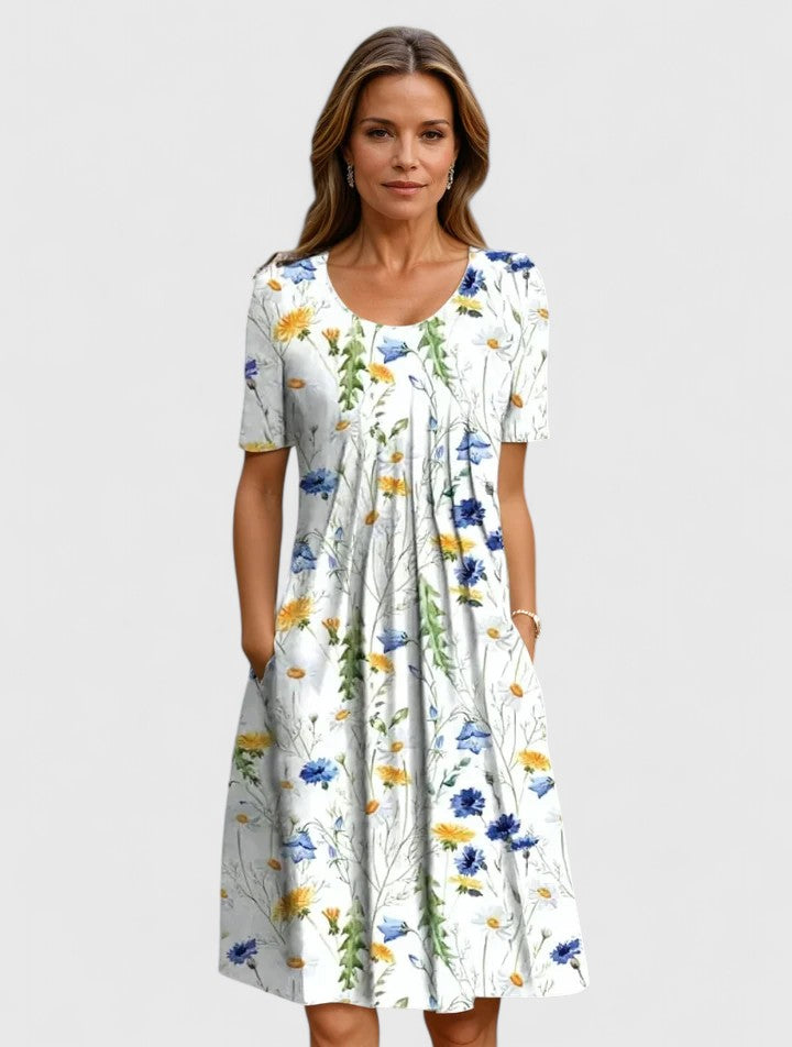 Elegant women's floral midi summer dress, perfect for garden parties or brunch. Chic feminine fashion.