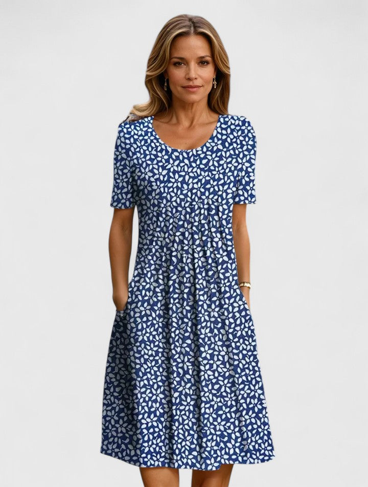 Beautiful women's elegant floral summer dress, a versatile midi style with convenient side pockets.